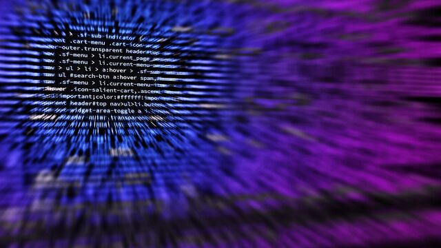 Blurred lines of website source code, representing manipulative black hat SEO techniques