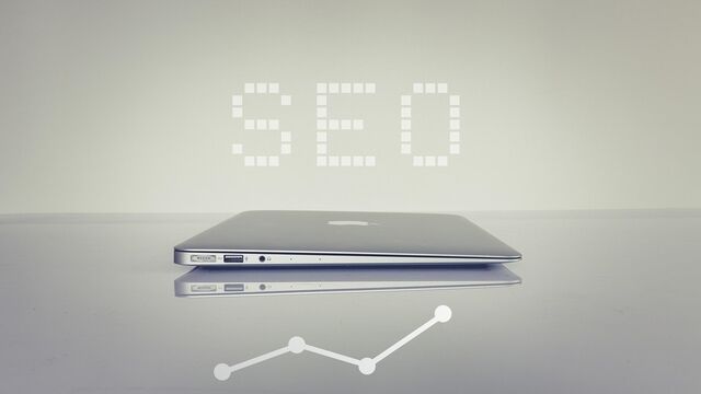 The word SEO displayed above a laptop, representing the core services an SEO company provides